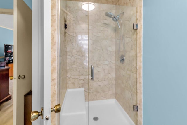 bathroom featuring a stall shower