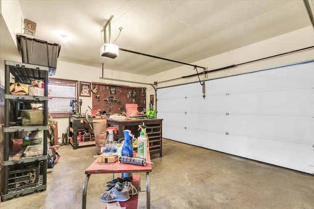 garage featuring a workshop area and a garage door opener