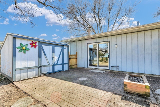 exterior space with a storage unit and an outbuilding