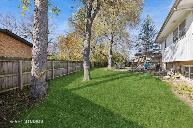 view of yard featuring a fenced backyard