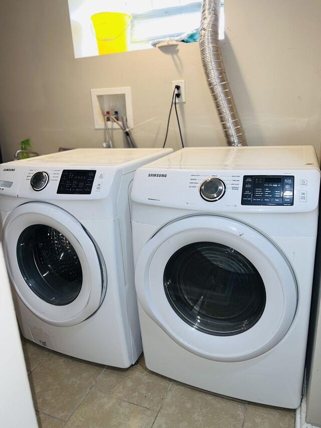 laundry room featuring laundry area and independent washer and dryer