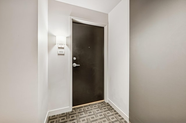 doorway with baseboards