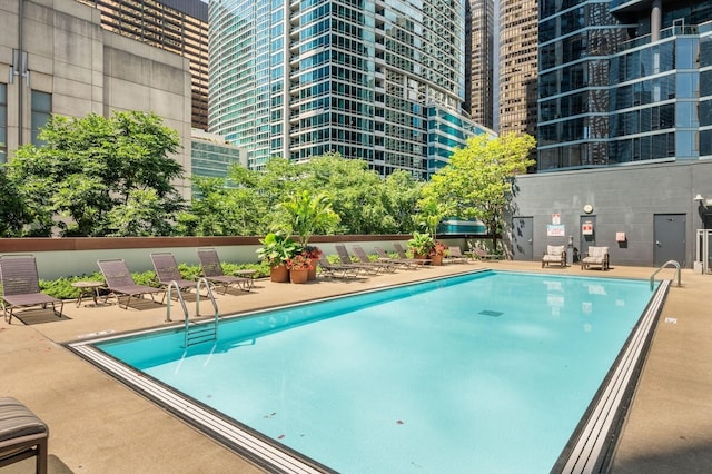 pool with a patio