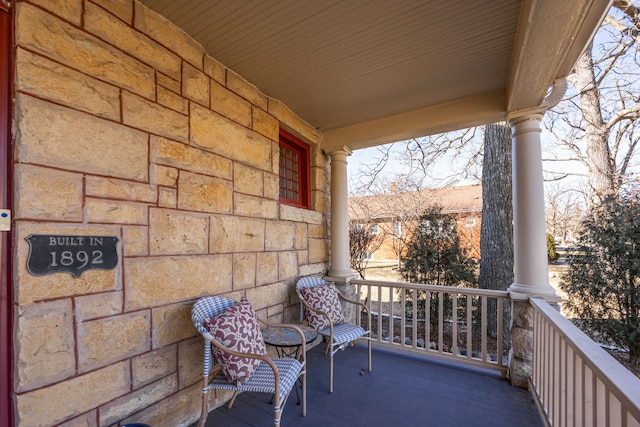 balcony featuring a porch