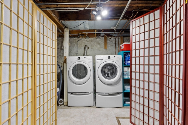 laundry area featuring laundry area and washer and dryer