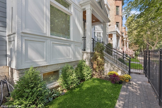 view of property exterior featuring fence