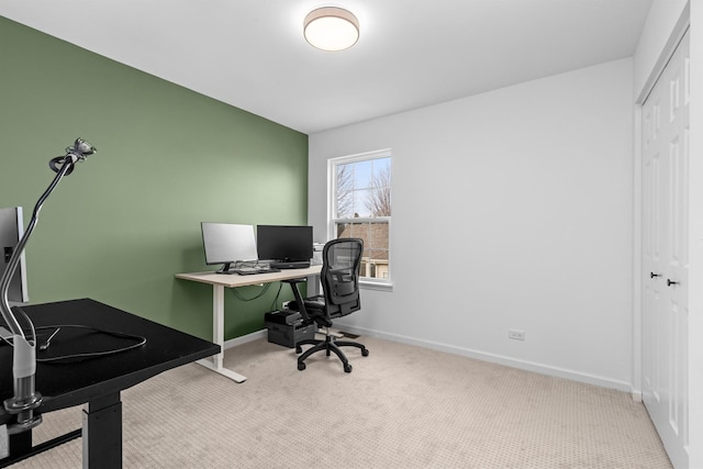 office space featuring carpet and baseboards