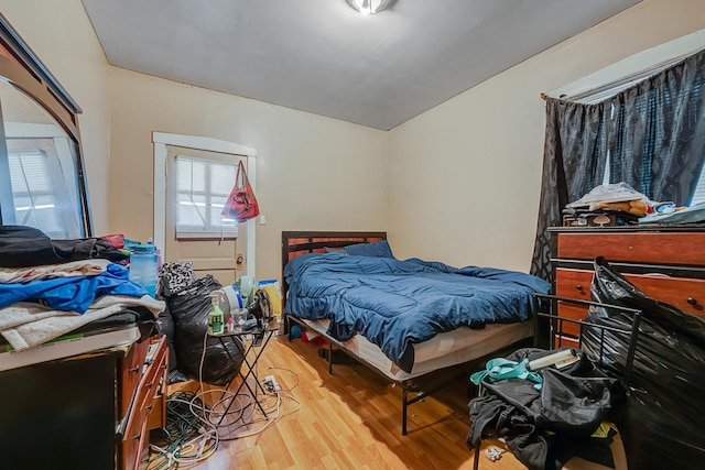 bedroom featuring wood finished floors