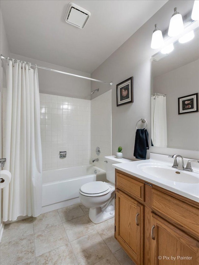 bathroom featuring shower / bath combo, visible vents, vanity, and toilet