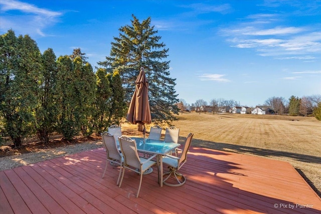 wooden deck featuring outdoor dining space