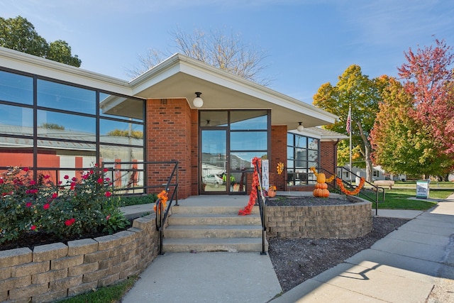 view of front of home with brick siding