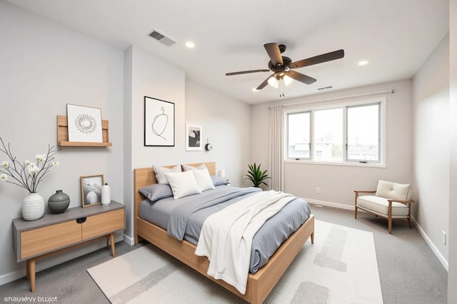 bedroom featuring recessed lighting, carpet flooring, visible vents, and baseboards