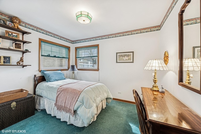 bedroom with baseboards and carpet floors