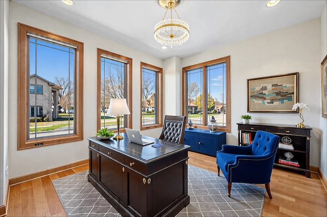 office area with baseboards, an inviting chandelier, wood finished floors, and recessed lighting