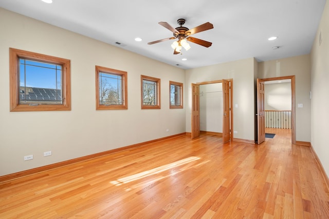 unfurnished bedroom with recessed lighting, visible vents, light wood-style flooring, and baseboards