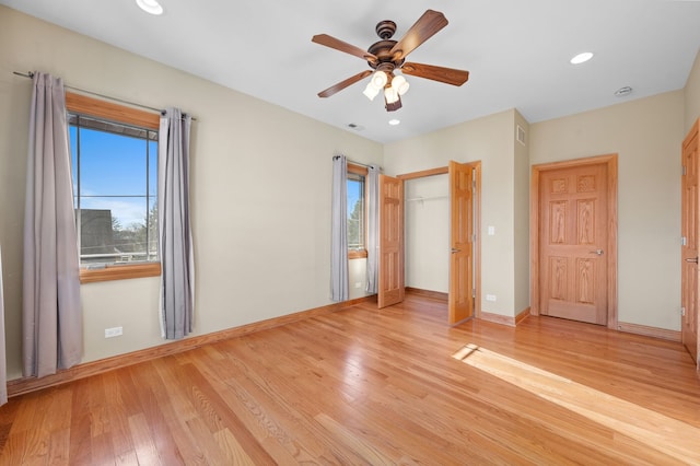 unfurnished bedroom featuring recessed lighting, visible vents, a ceiling fan, baseboards, and light wood finished floors