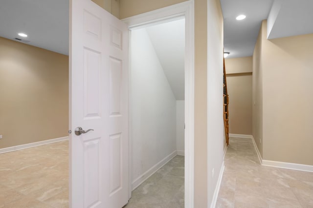 interior space with baseboards, visible vents, and recessed lighting