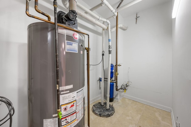 utility room with gas water heater