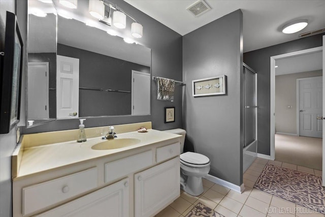 full bathroom with toilet, vanity, visible vents, and tile patterned floors