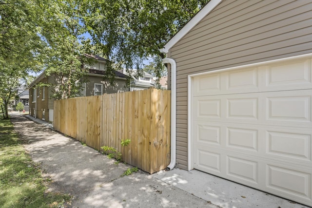 garage featuring fence