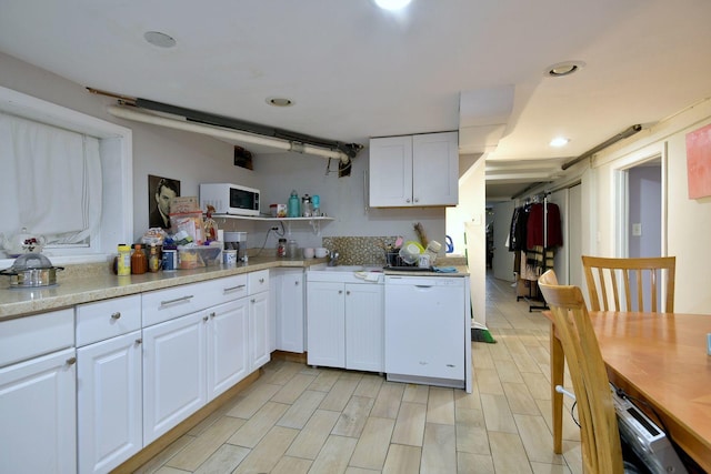 kitchen featuring white appliances, wood tiled floor, white cabinetry, open shelves, and recessed lighting