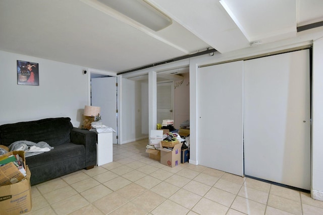 living room with light tile patterned floors