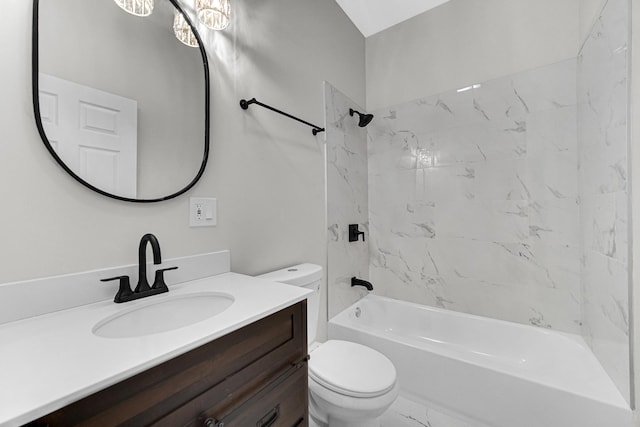 bathroom with marble finish floor, shower / bathing tub combination, vanity, and toilet