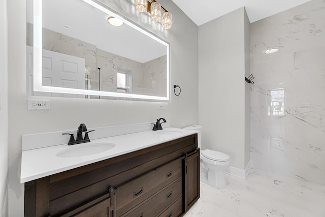 full bath with marble finish floor, double vanity, a sink, and a marble finish shower