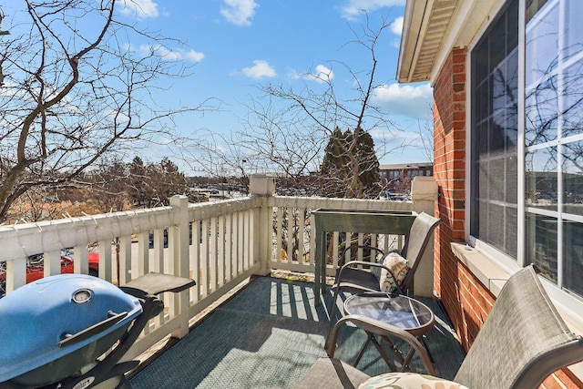 balcony featuring area for grilling