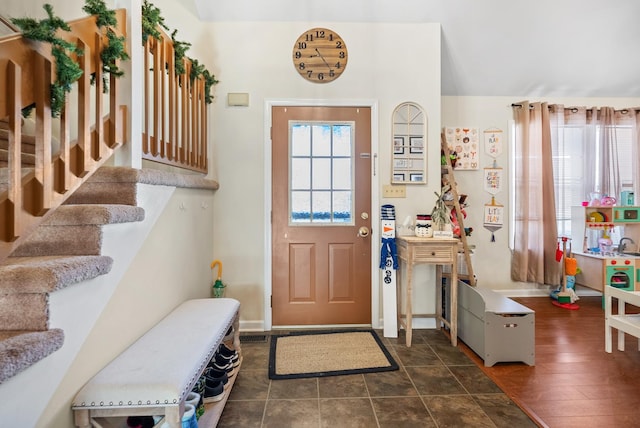 entryway featuring stairs