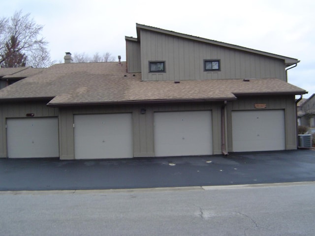 garage with central AC unit