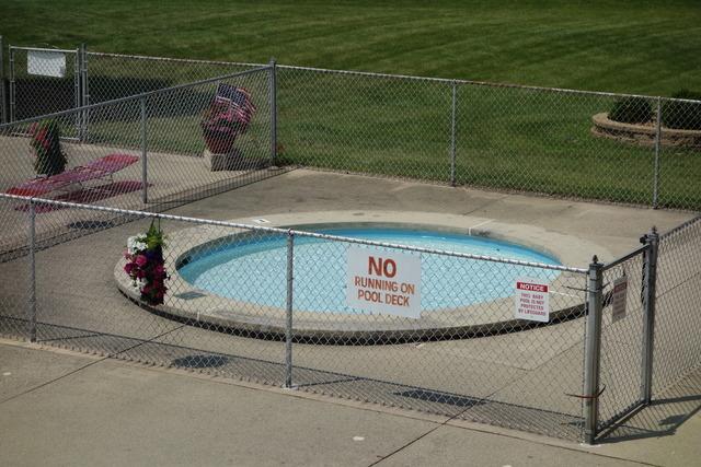 view of pool with fence