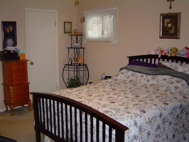 bedroom featuring carpet