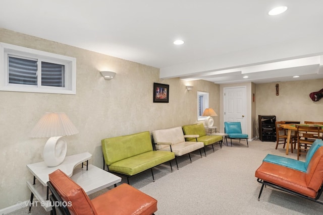 living room featuring carpet and recessed lighting