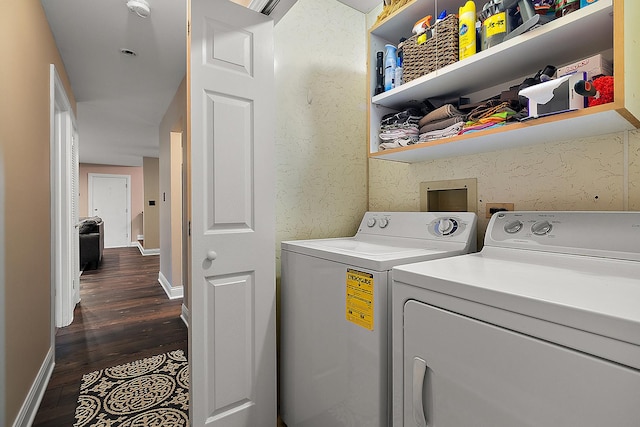 laundry room featuring dark wood finished floors, laundry area, independent washer and dryer, baseboards, and wallpapered walls