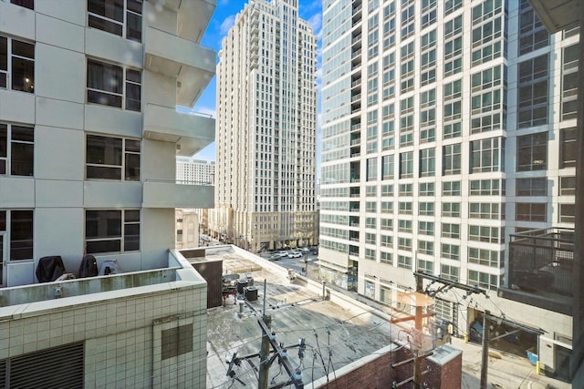 view of building exterior featuring a view of city