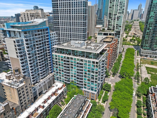 birds eye view of property with a city view