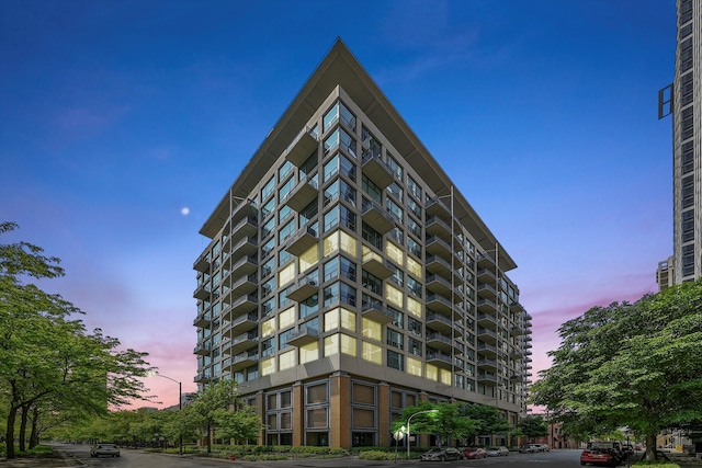 view of property at dusk