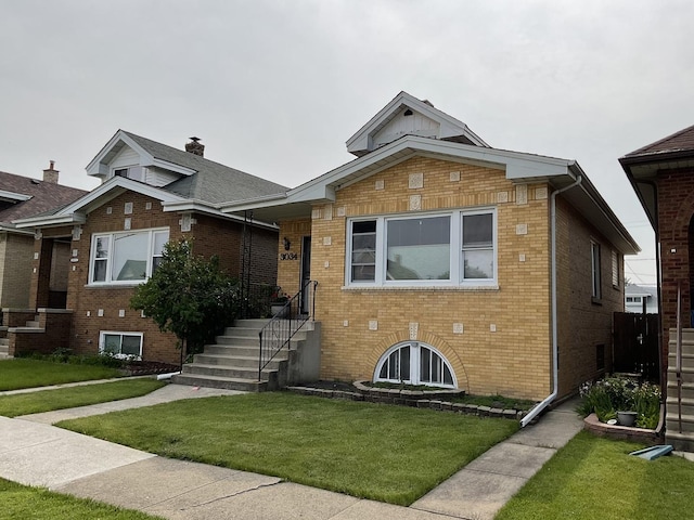3034 N 76th Ave N, Elmwood Park, IL 60707 - view of front of property with a front lawn and brick siding