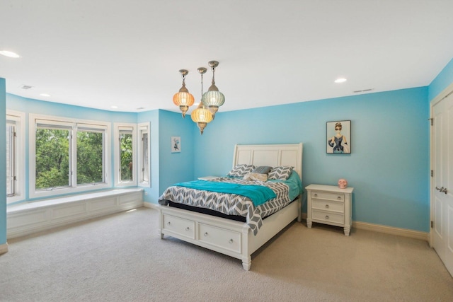 carpeted bedroom with baseboards, visible vents, and recessed lighting