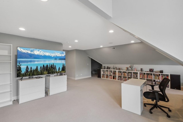 home office with lofted ceiling, recessed lighting, and light colored carpet