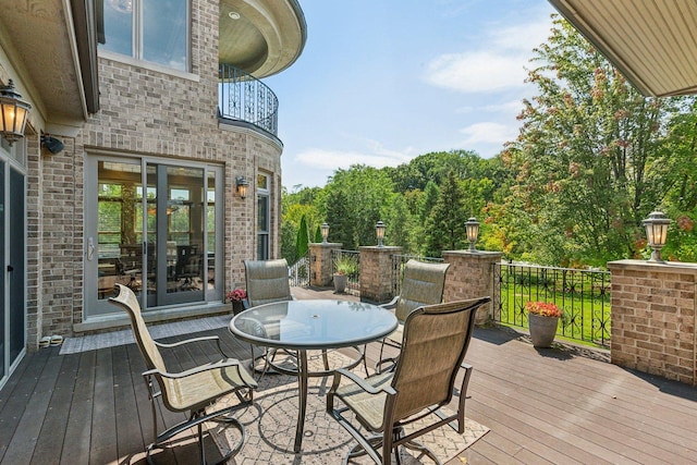 wooden deck with outdoor dining area