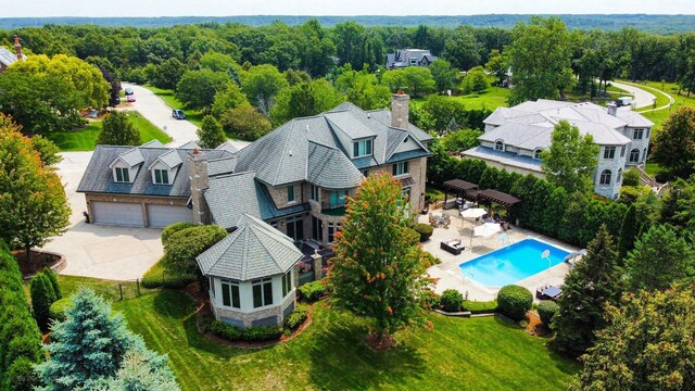 birds eye view of property with a residential view