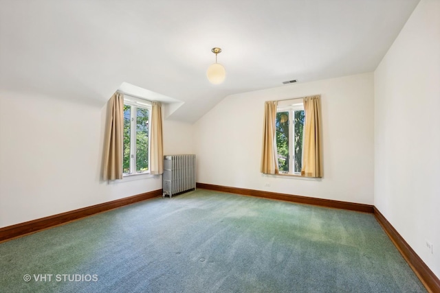 bonus room with visible vents, radiator, baseboards, lofted ceiling, and carpet flooring