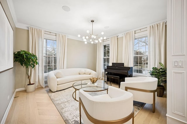 living room featuring a wealth of natural light, crown molding, and wood finished floors