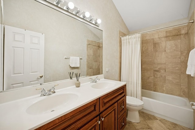 bathroom with double vanity, toilet, shower / tub combo, and a sink