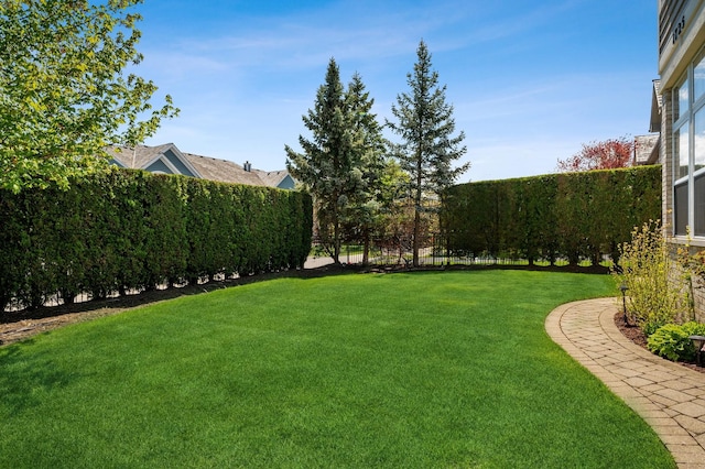 view of yard with fence