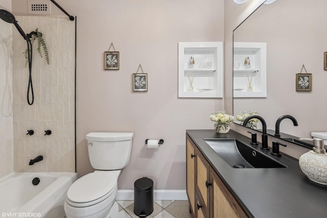 bathroom with visible vents, toilet, vanity, and tile patterned flooring