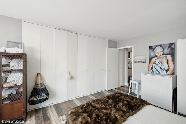 bedroom with wood finished floors