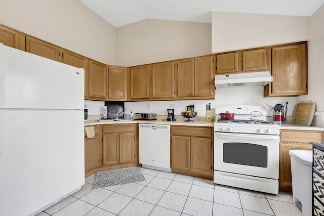 kitchen featuring white appliances, light tile patterned floors, under cabinet range hood, and light countertops